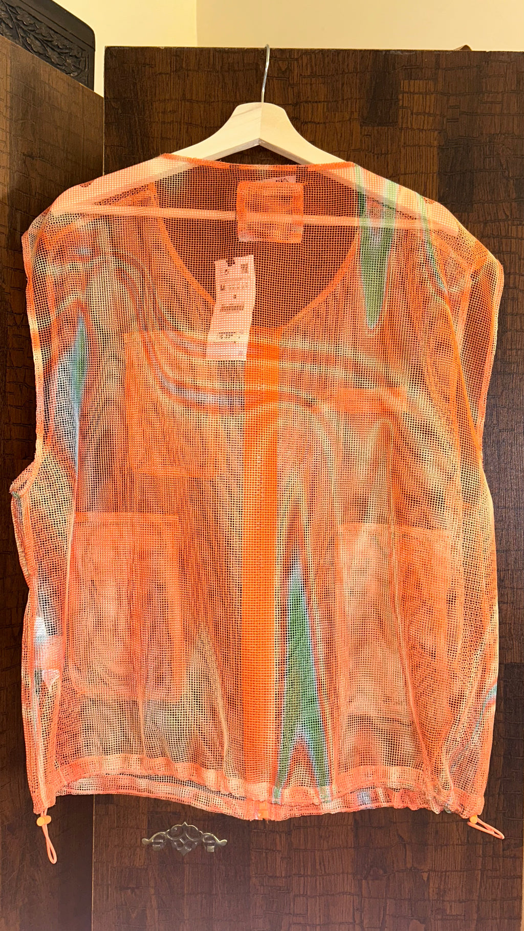 Orange mesh vest