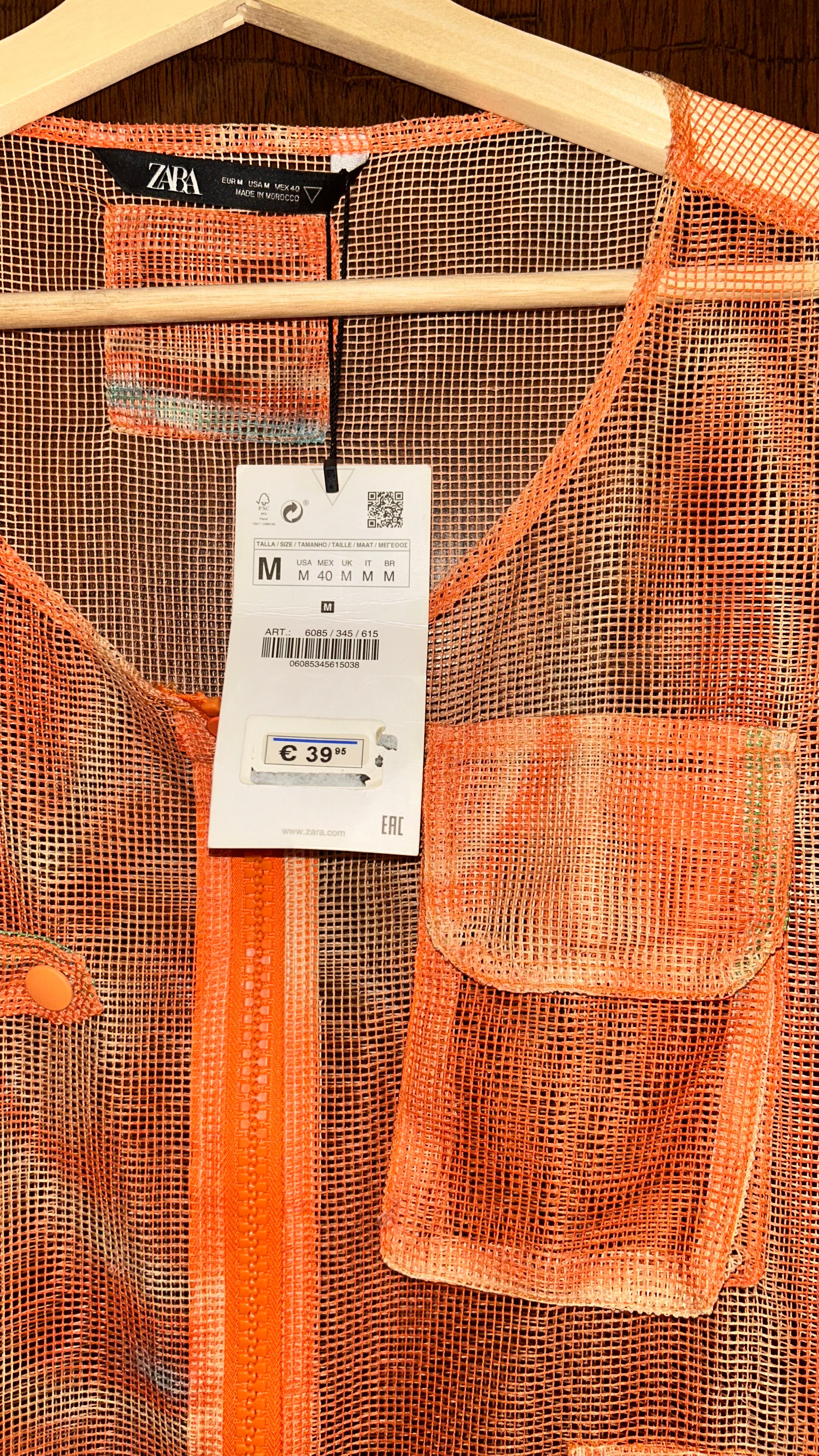 Orange mesh vest