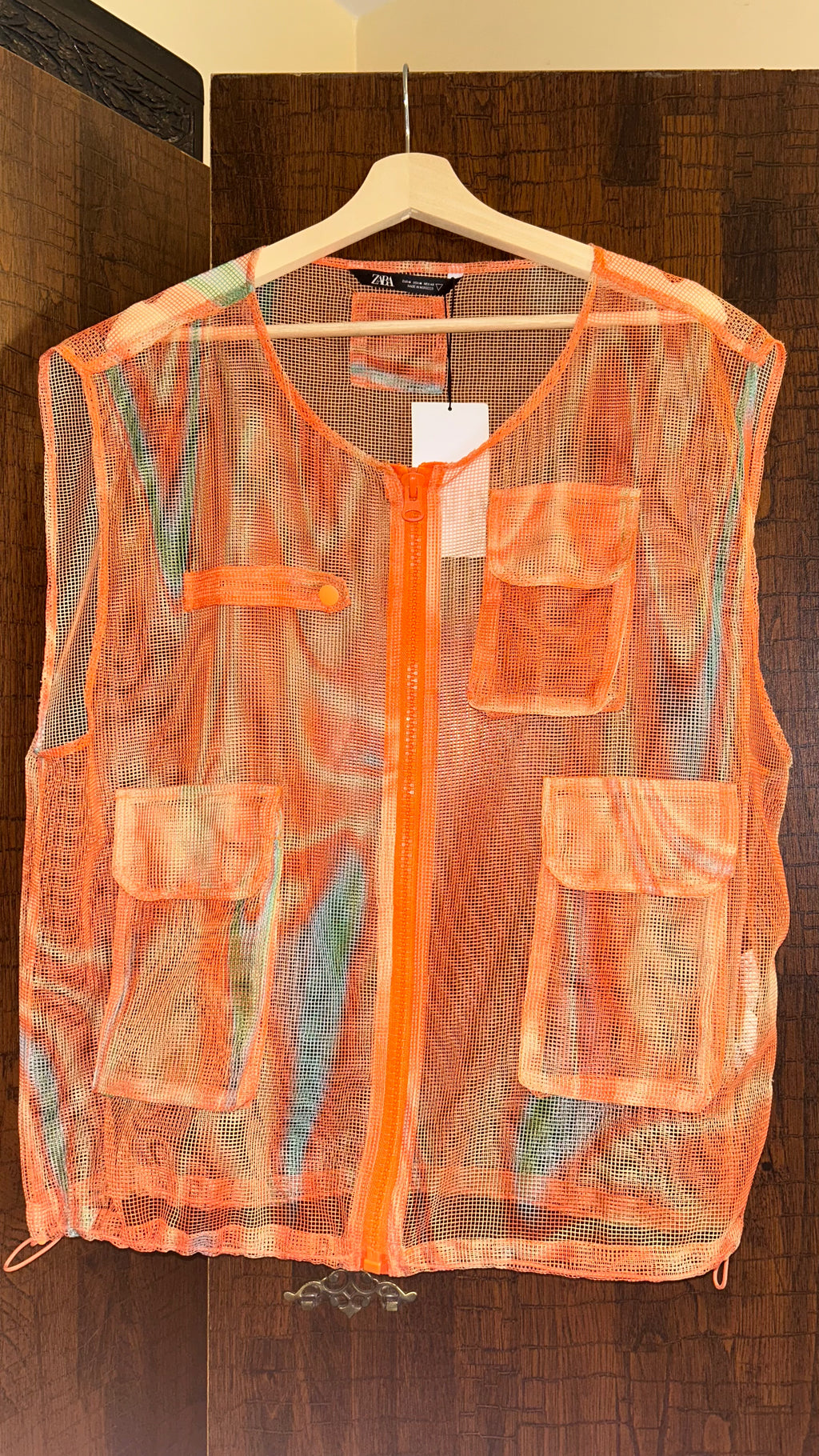 Orange mesh vest