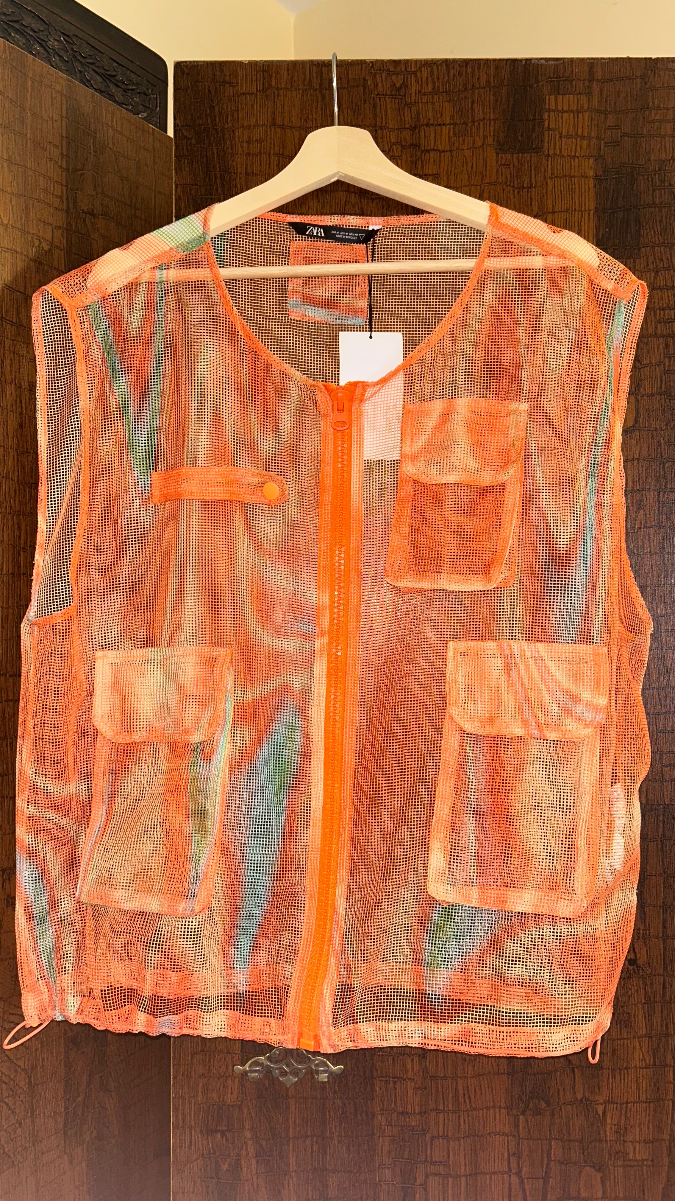 Orange mesh vest